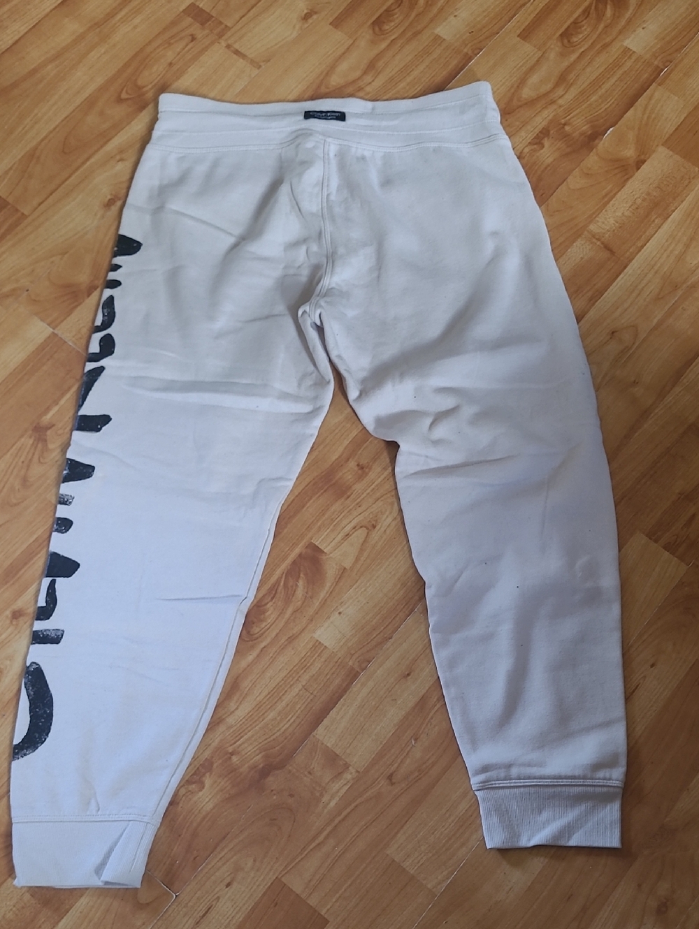 Calvin Klein Performance Cream Joggers with Black Logo Accent - Picture 3 of 5